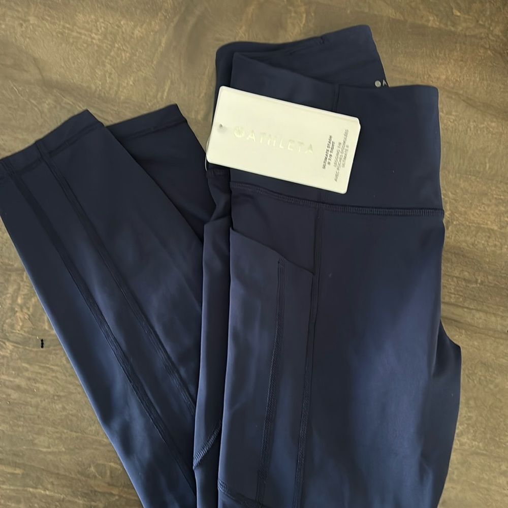 Athleta Ultimate Stash II 7/8 Tight. Size S. Pockets on each side. New with tags